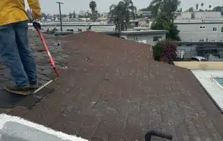 Removal and disposal of damaged roofing materials