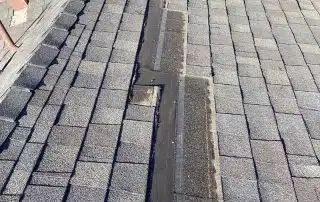 Los Angeles house with newly replaced roof shingles.