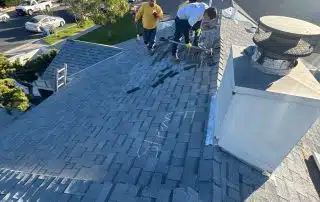 old roof shingles being removed
