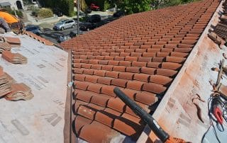 Getting ready to remove the old red clay tiles