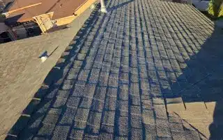 warped shingles needing to be replaced