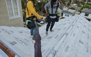 Roof workers prepping the job