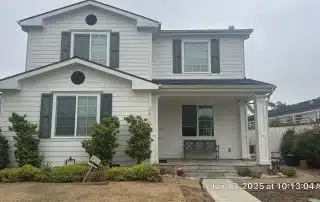 1-Jun 12 2025 10_13am-onsK Two-story white house with front porch