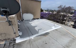 Rooftop with satellite dish and cityscape background