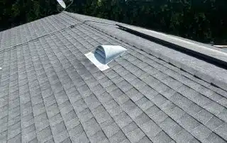 20-Jun 26 2025 10_56am-CAy8 Gray shingle rooftop with vent and satellite dish.