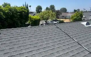 22-Jun 26 2025 10_56am-VWAb Suburban rooftops under clear blue sky