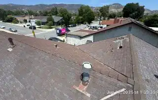 24-Jun 12 2025 01_39pm-mjuj View from rooftop over suburban neighborhood