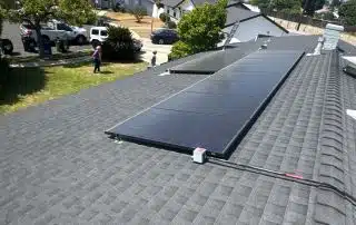 28-Jun 26 2025 10_56am-Zm5a Rooftop solar panels on sunny suburban house.