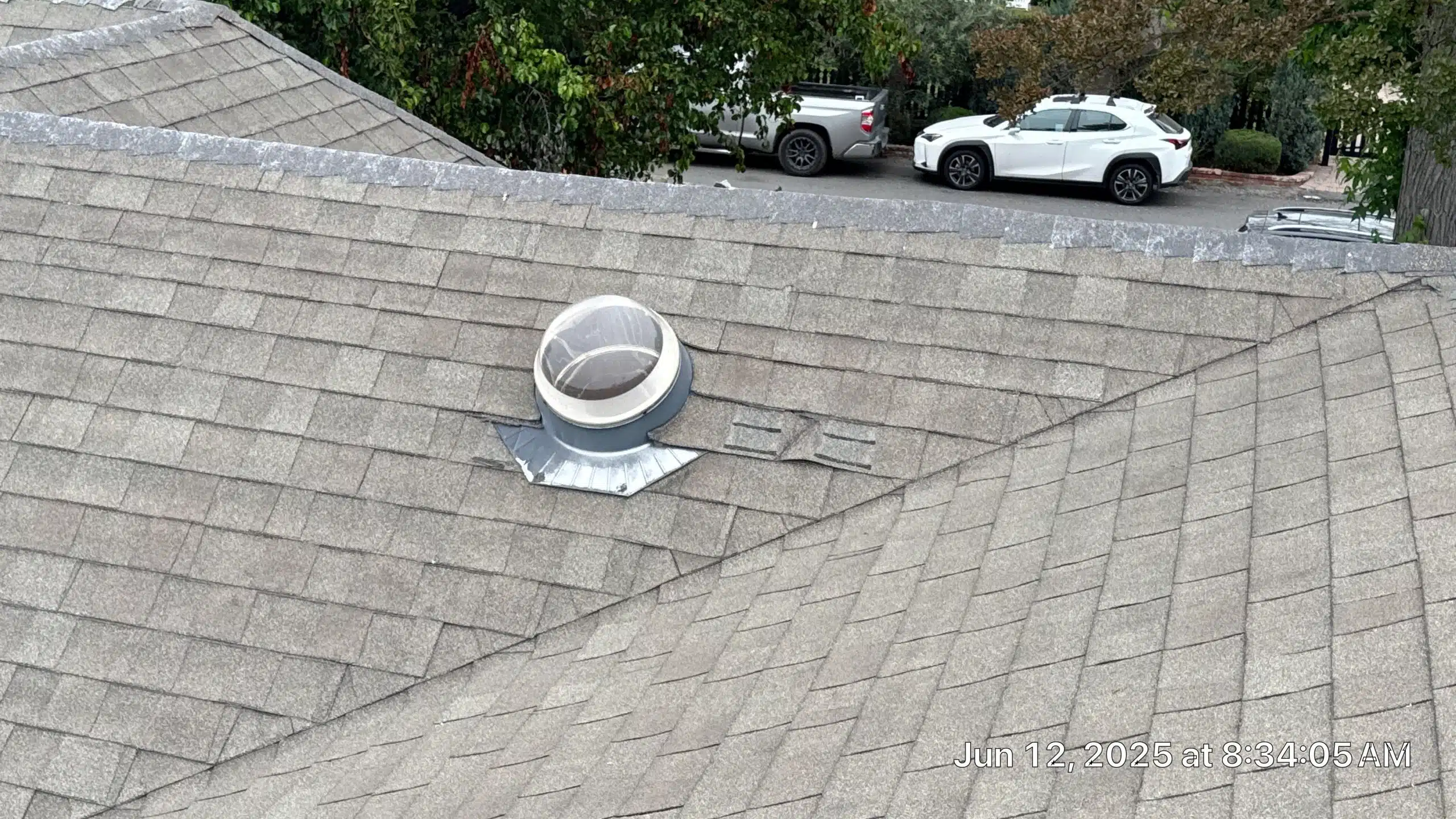 Roof with dome vent and shingles