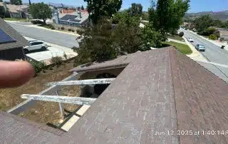 37-Jun 12 2025 01_40pm-UfTp Rooftop view of suburban neighborhood street.