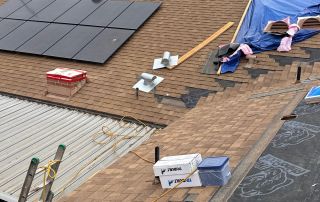 4-Jun 09 2025 09_37am-Yow4 Roof with solar panels and construction materials.