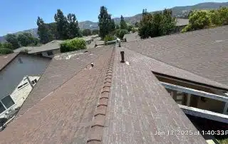 46-Jun 12 2025 01_40pm-Cu6E Rooftop with mountains and trees in the background.