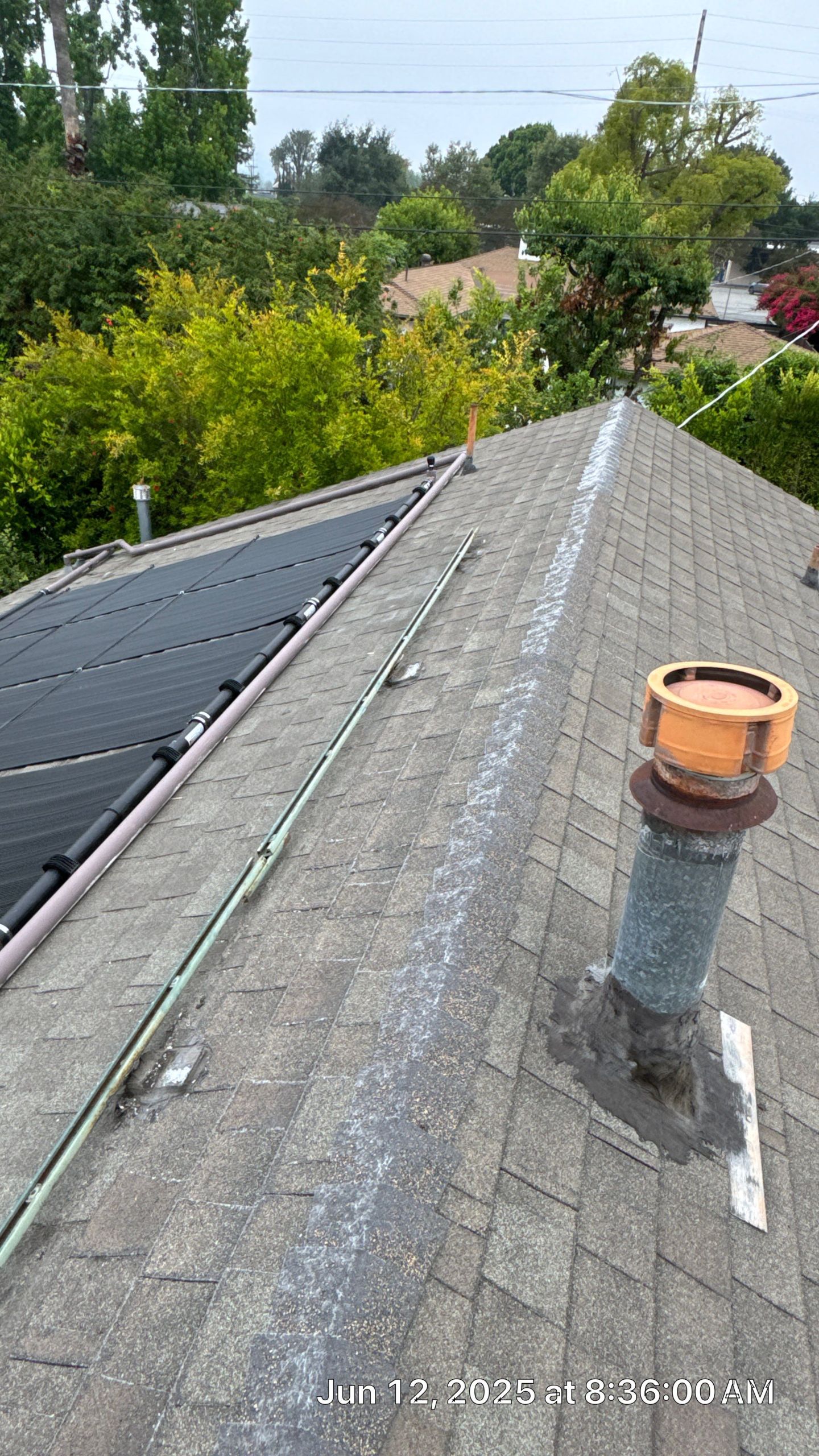 46-Jun 12 2025 08_36am-WPPs Rooftop with solar panels and chimney.