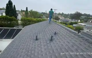 5-Jun 12 2025 10_22am-yvVY Person walking on roof with overcast sky