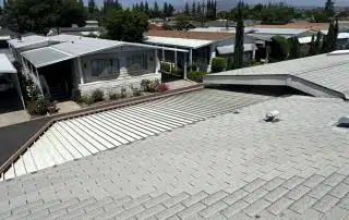 Suburban neighborhood view from rooftop on sunny day.