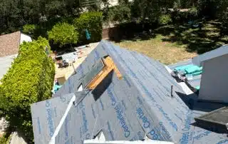 Rooftop under construction with CertainTeed material