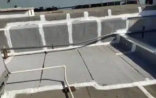13-Sep 02 2025 04_18pm-71AJ Rooftop with waterproofing sealant and pipes visible