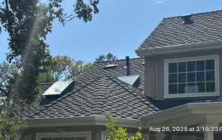 House roof with skylights in sunlight
