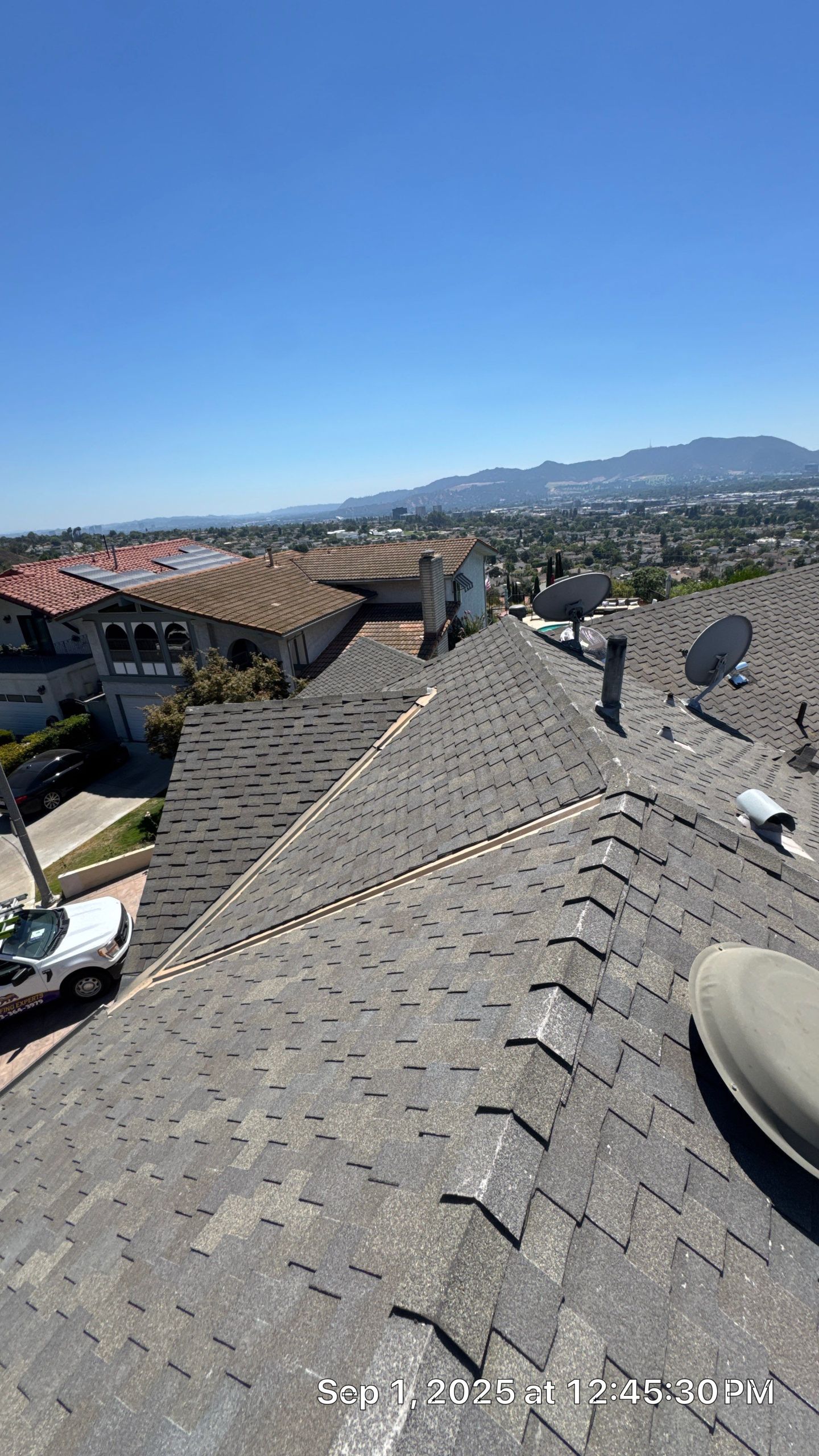 Cityscape view from rooftop with clear sky