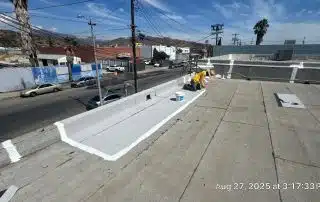 7-Aug 27 2025 03_17pm-N3jG Person painting rooftop on sunny day