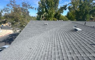 Gray shingle roof under clear sky
