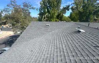 1-Oct 02 2025 01_35pm-o6yw Gray shingle roof under clear sky