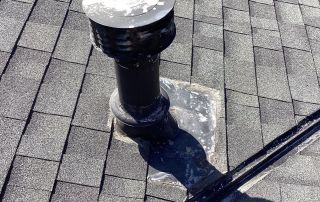 Vent pipe on shingle roof