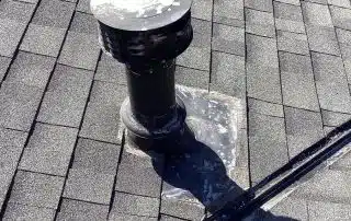 Vent pipe on shingle roof