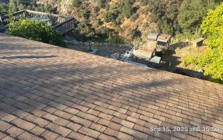 13-Sep 15 2025 08_35am-nfm4 Rooftop view overlooking patio with grill.