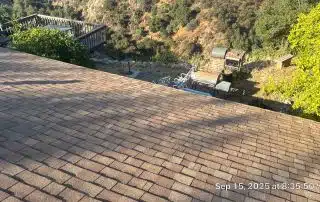 13-Sep 15 2025 08_35am-nfm4 Rooftop view overlooking patio with grill.