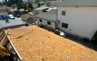 Construction workers installing a new roof.