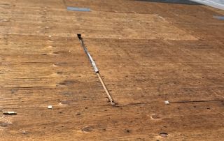 6-Sep 11 2025 02_40pm-uw3j Plywood roof deck under clear sky