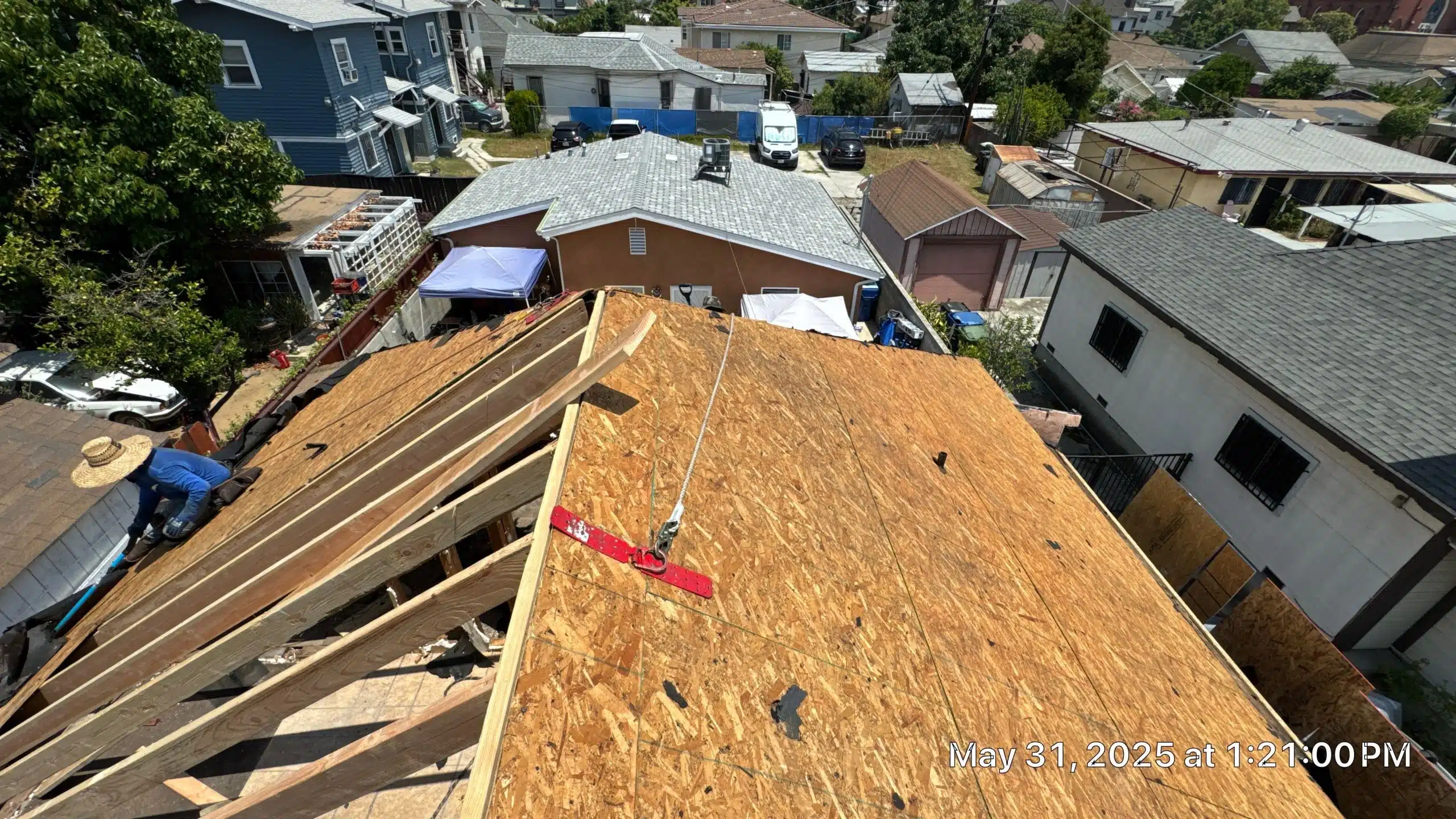 Rooftop construction in suburban neighborhood view