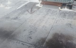 11-Dec 25 2025 01_08pm-aaJS Rooftop with air conditioning units and graffiti.