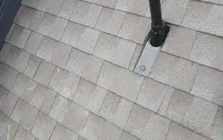 11-Feb 10 2026 11_03am-CX4G Gray shingled roof with black vent pipe.