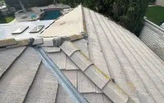 Rooftop view with trees and pool below