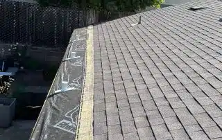 Rooftop view showing roof shingles installation.