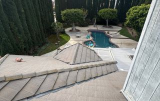 20-Feb 12 2026 03_22pm-oRPN View of backyard pool surrounded by tall trees.