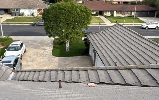25-Feb 12 2026 03_23pm-YM2T Suburban neighborhood with rooftops and trees visible.