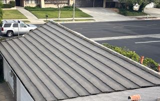 26-Feb 12 2026 03_24pm-kfBN Suburban neighborhood with houses and rooftops from above.