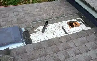 4-Feb 10 2026 09_07am-swyB Roof shingles missing around vent pipe repair area.