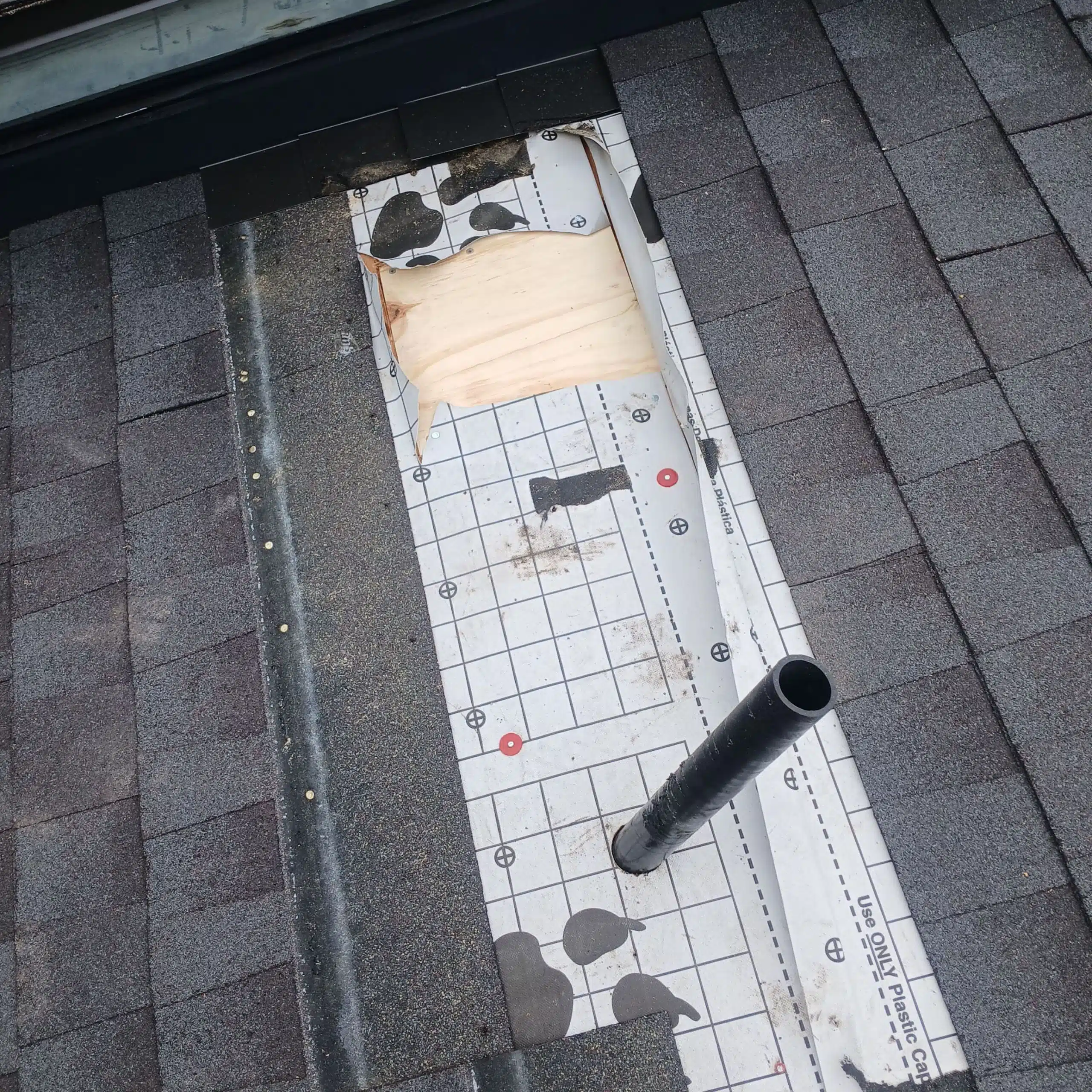 6-Feb 10 2026 10_11am-Giaq Roof repair with exposed underlayment and pipe.