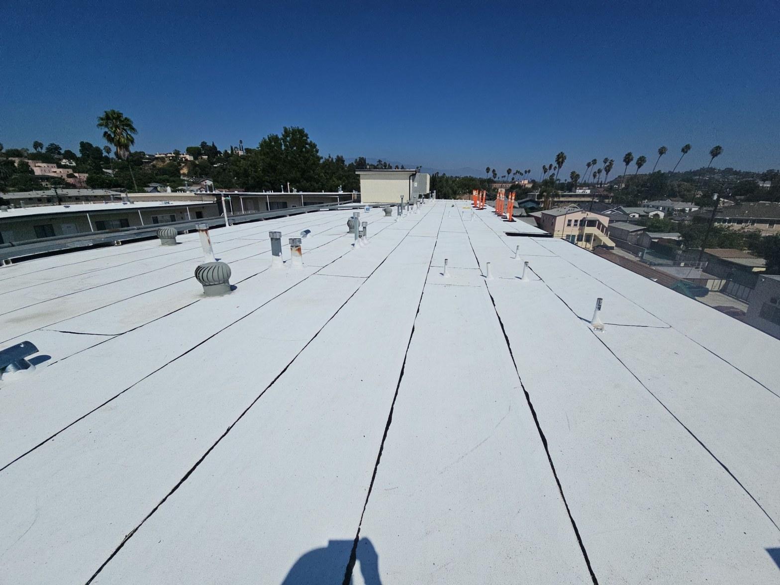 Completed flat roof repair work at Roof Repair & Construction Inc.