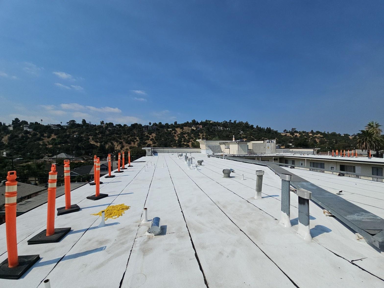 Completed flat roof repair work at Roof Repair & Construction Inc.