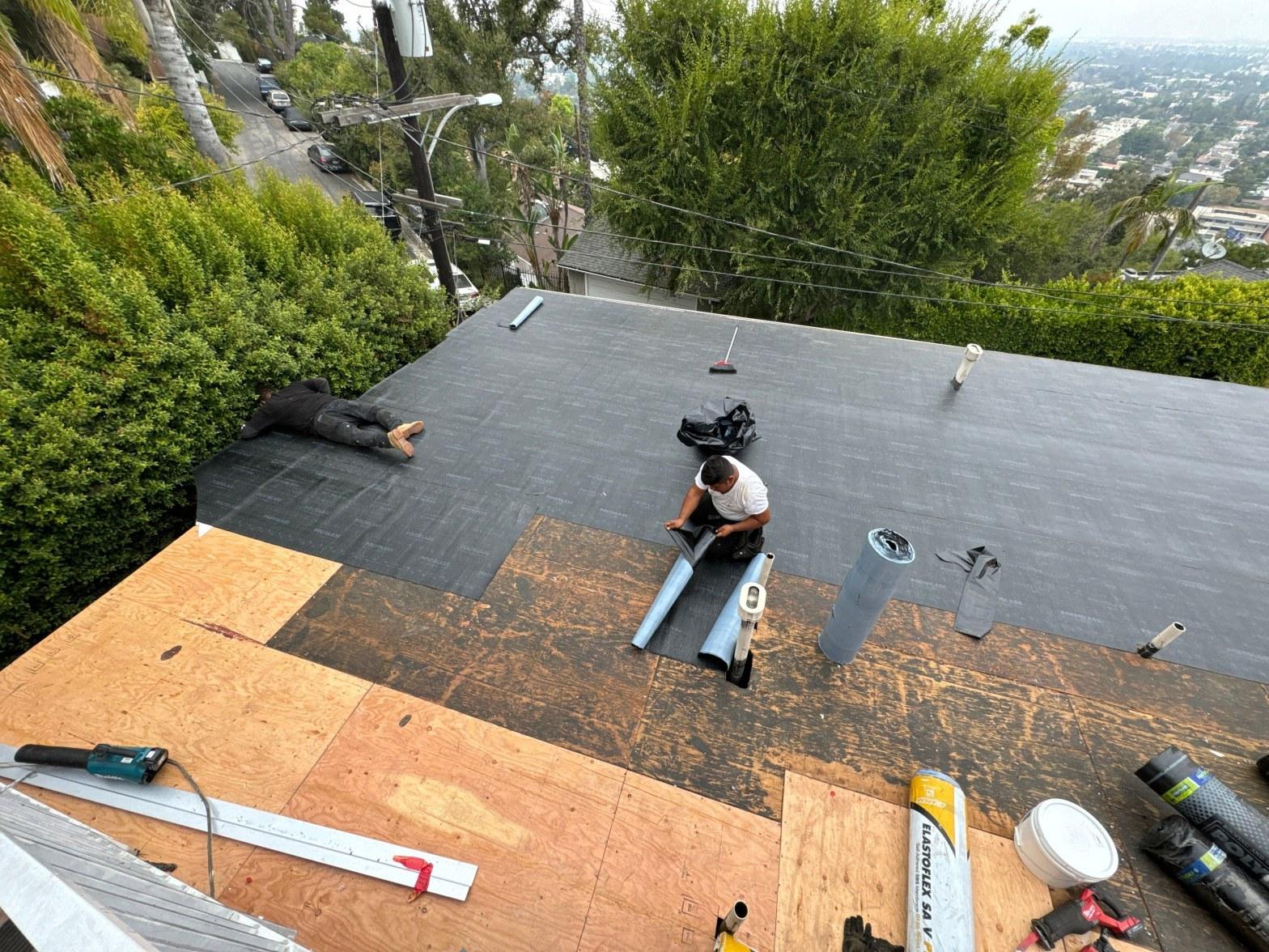 Completed flat roof repair work at Roof Repair & Construction Inc.