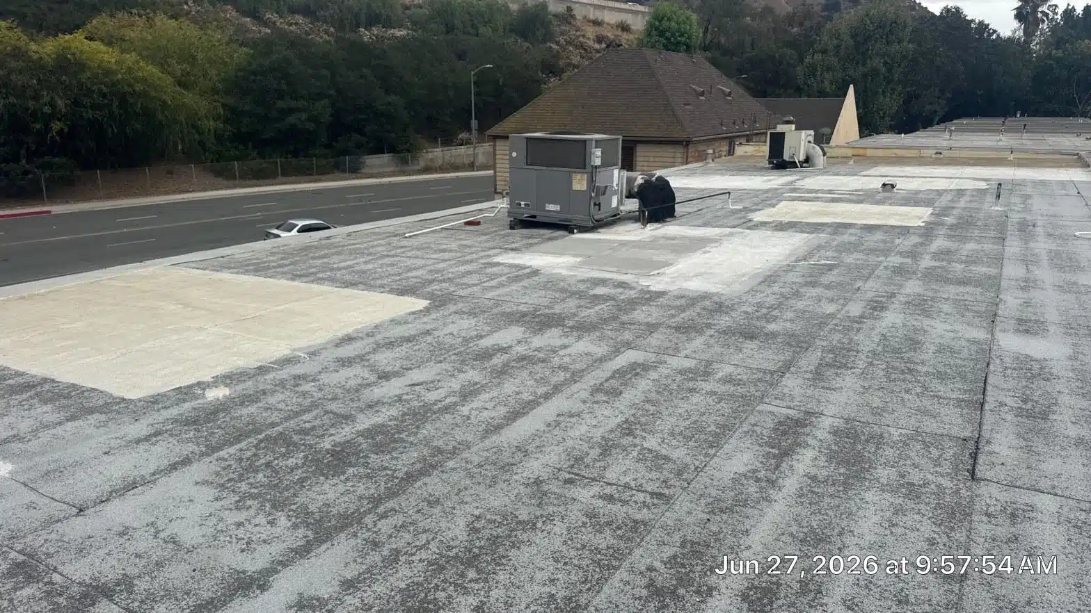 Completed flat roof repair work at Roof Repair & Construction Inc.