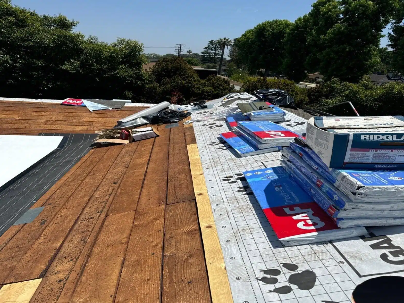Completed fire and smoke roof damage repair work at Roof Repair & Construction Inc.
