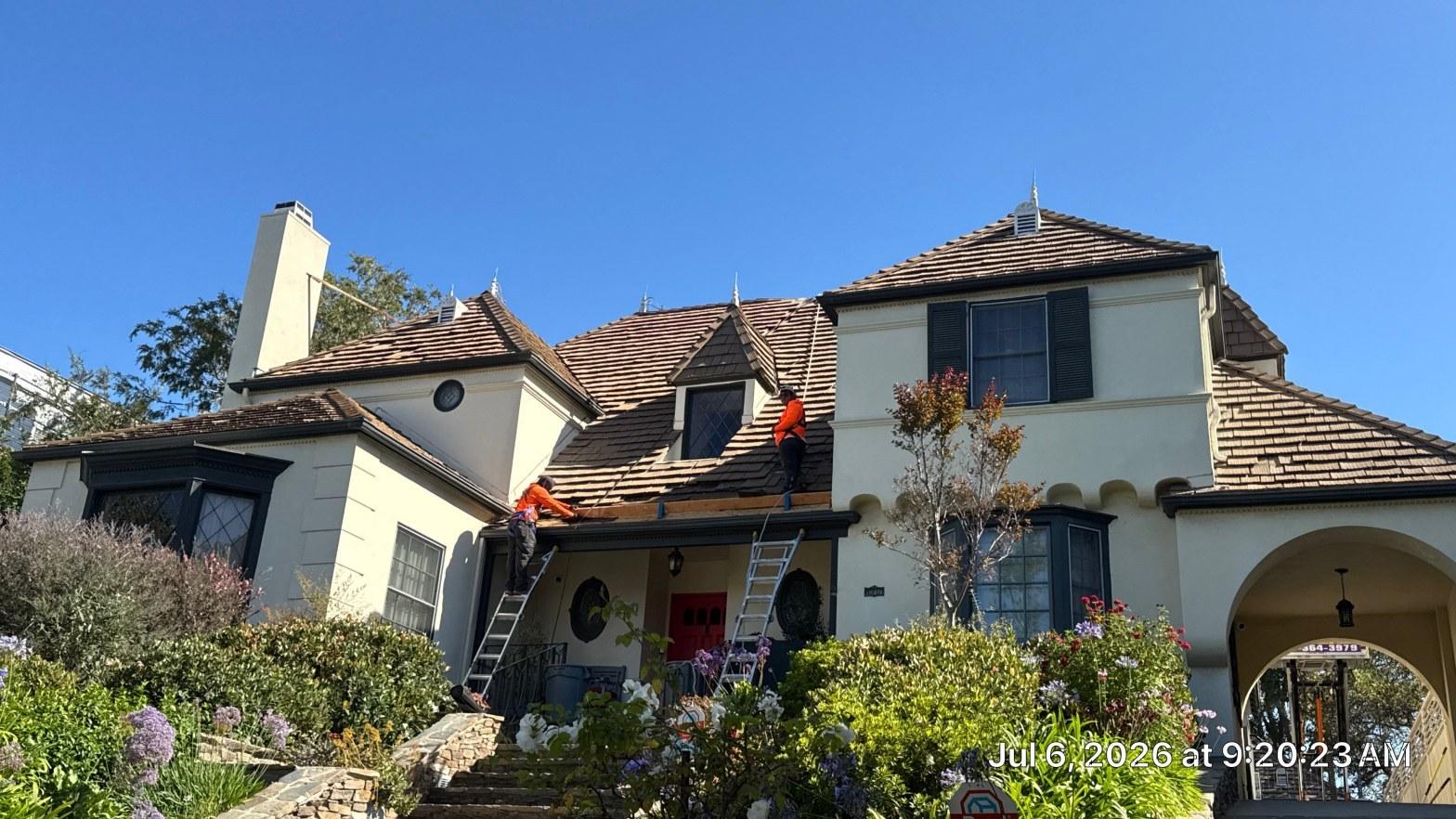 Completed fire and smoke roof damage repair work at Roof Repair & Construction Inc.